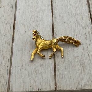Gold Horse Brooch with Red and Clear Accents